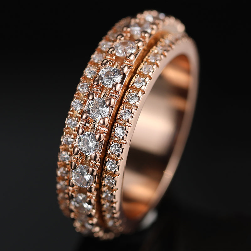 Left side of this Iced Out 3-Row Spinner Ring RG