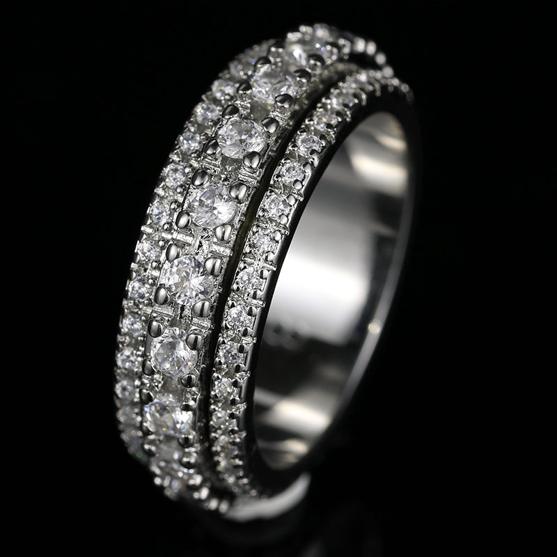 Left side of this Iced Out 3-Row Spinner Ring WG