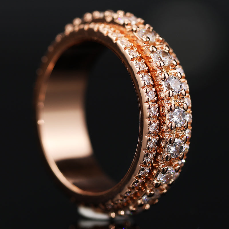 Right side of this Iced Out 3-Row Spinner Ring RG
