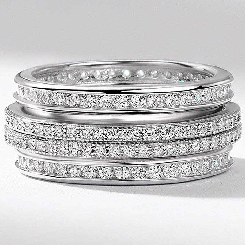 close shot of this iced out double spinner ring