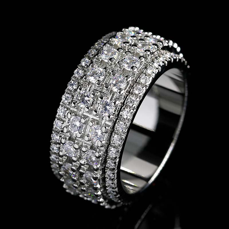 Left side of Iced Out 4-Row Spinner Ring WG