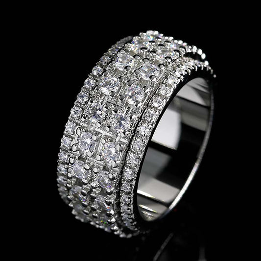 Left side of Iced Out 4-Row Spinner Ring WG
