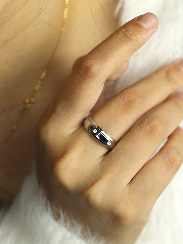 Woman wearing 7 Moissanite Spinner Fidget Ring(White Gold finish)